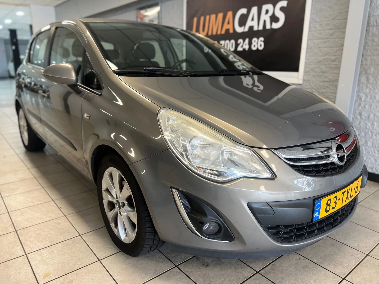 Opel Corsa (2012) — foto 1
