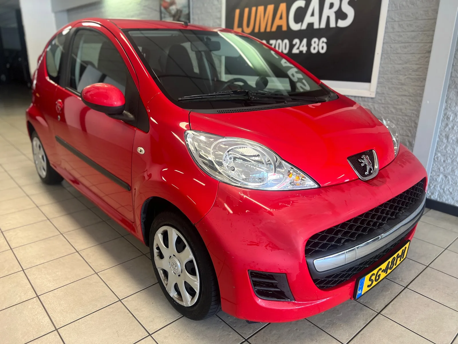 Peugeot 107 (2009) — foto 1
