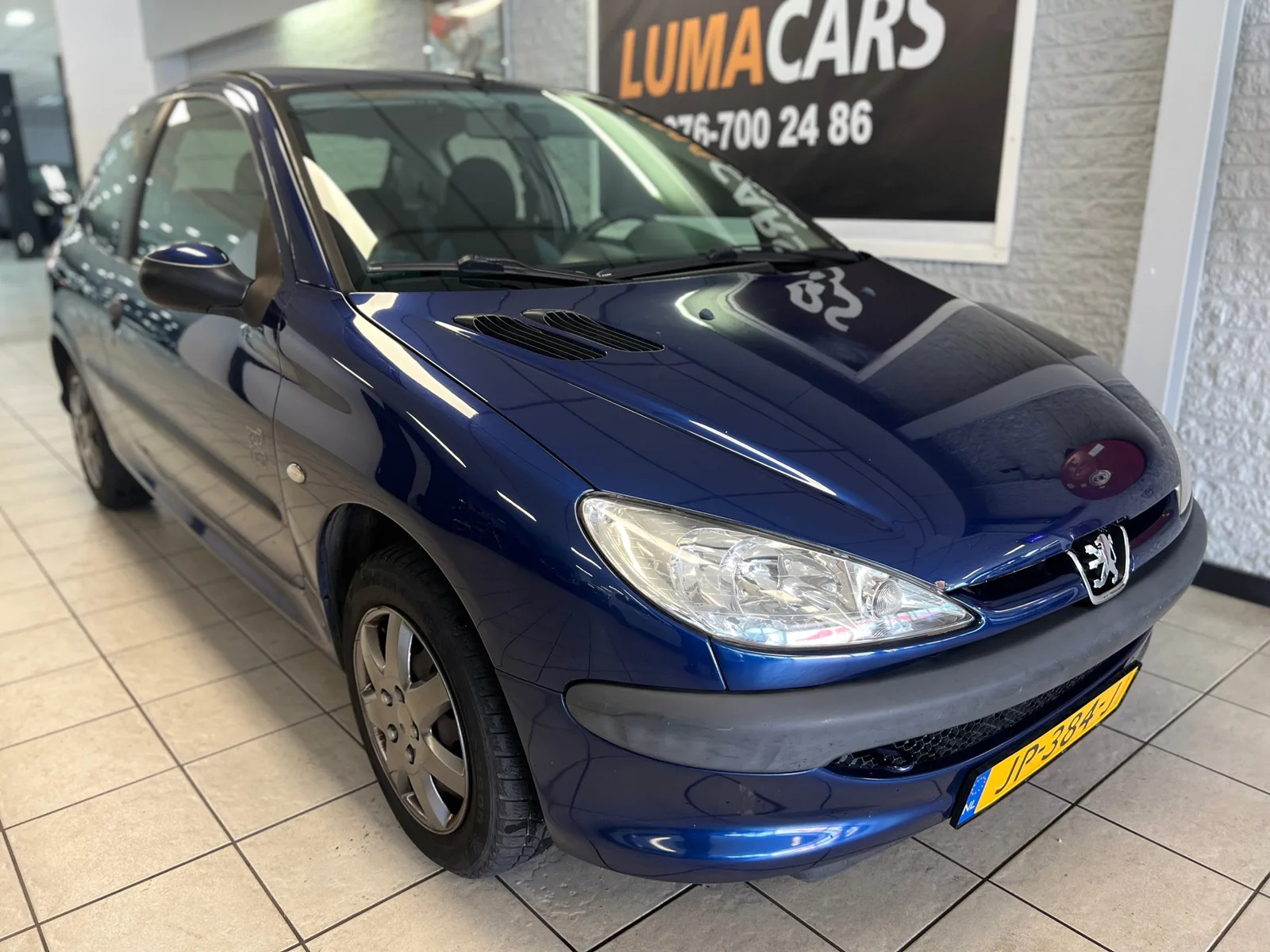 Peugeot 206 (2004) — foto 1