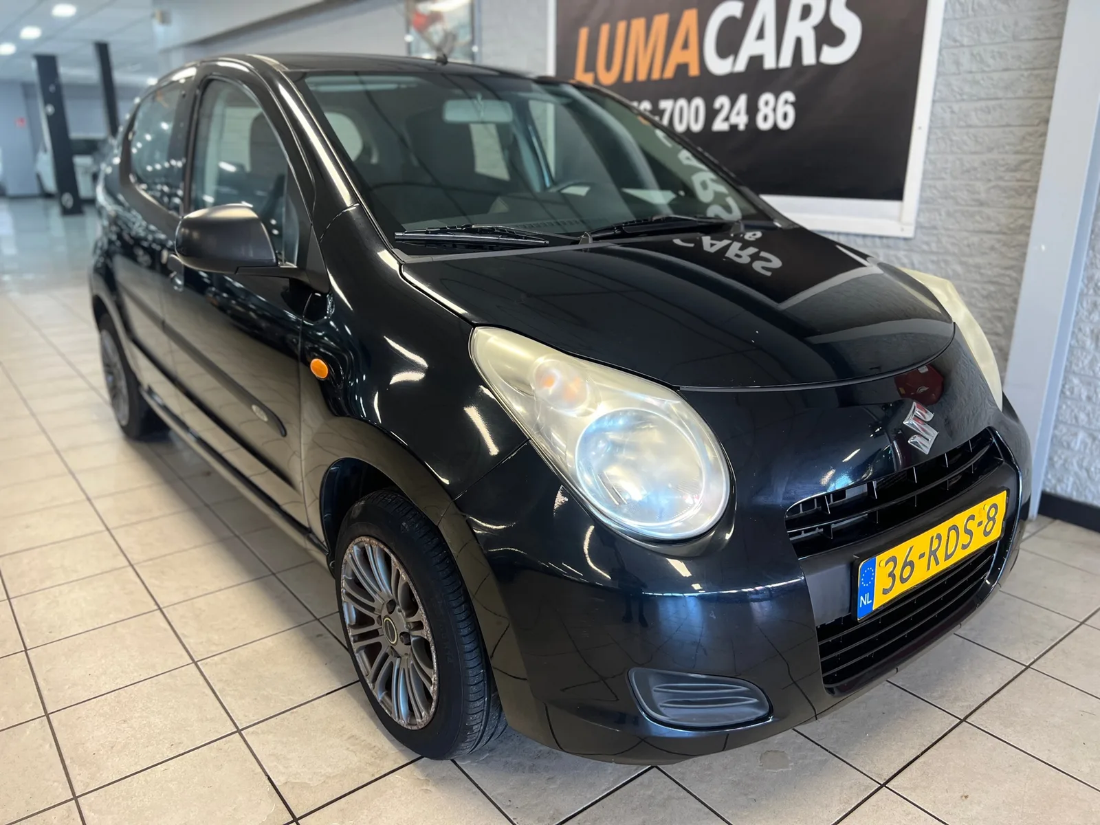 Suzuki Alto (2011) — foto 1