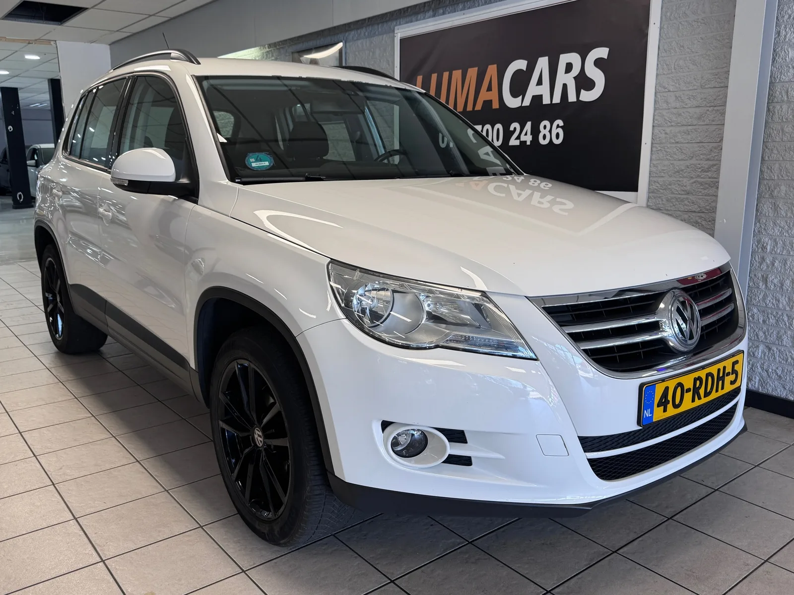 Volkswagen Tiguan (2011) — foto 1