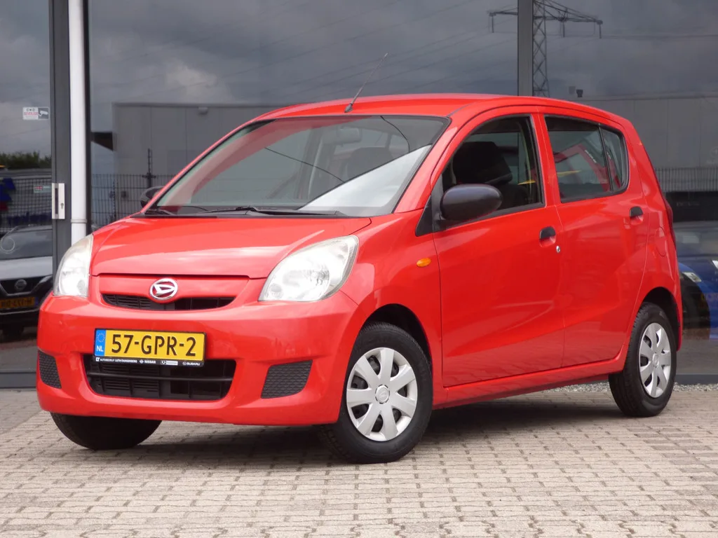 Daihatsu Cuore (2008) — foto 1