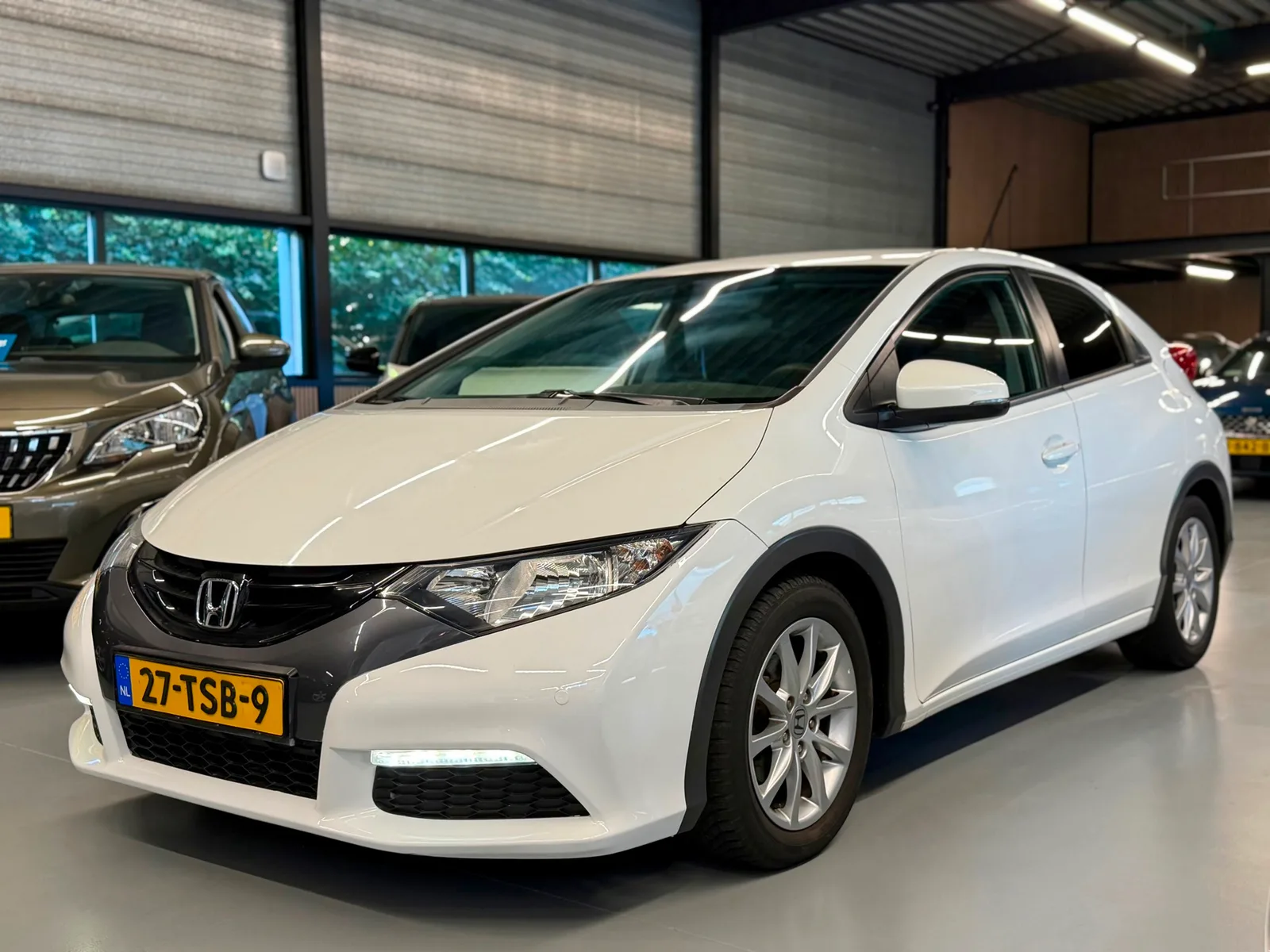 Honda Civic (2012) — foto 1