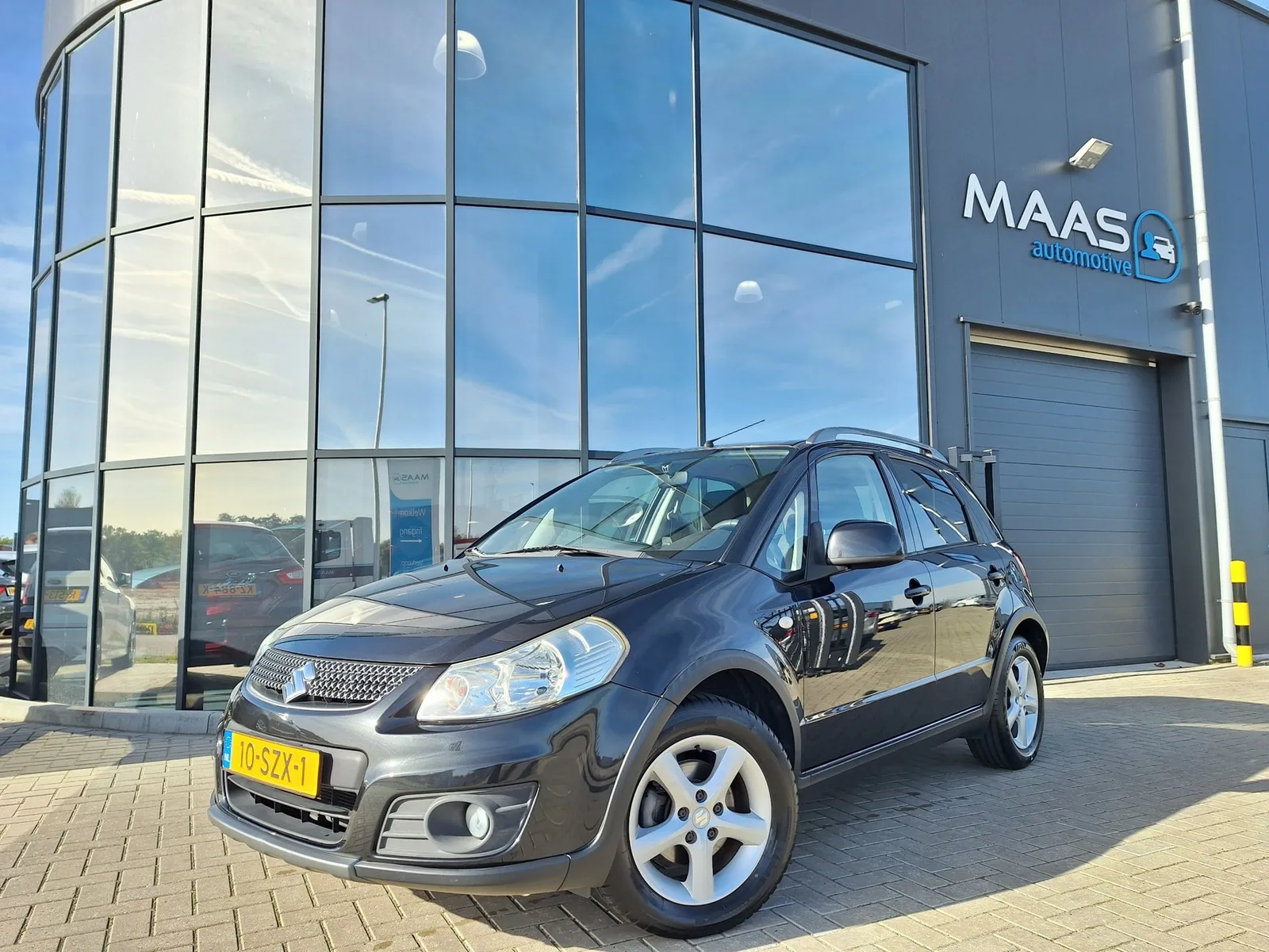 Suzuki SX4 (2012) — foto 1