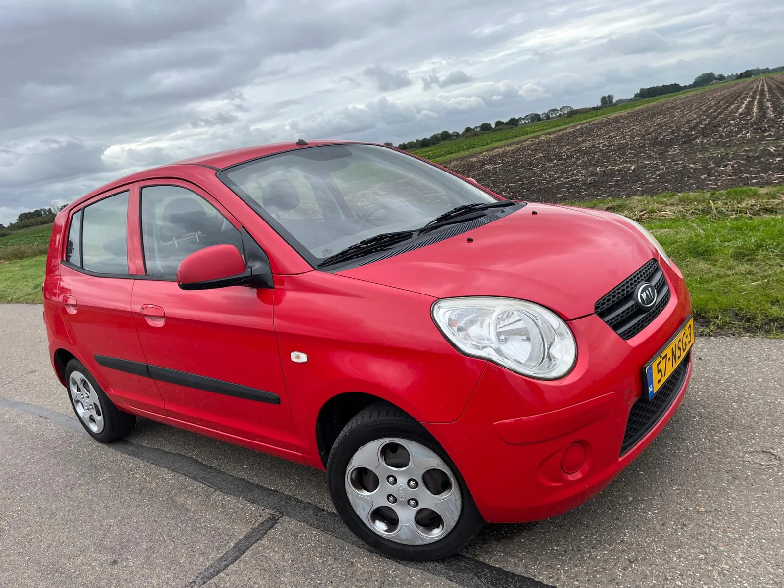 Kia Picanto (2011) — foto 1