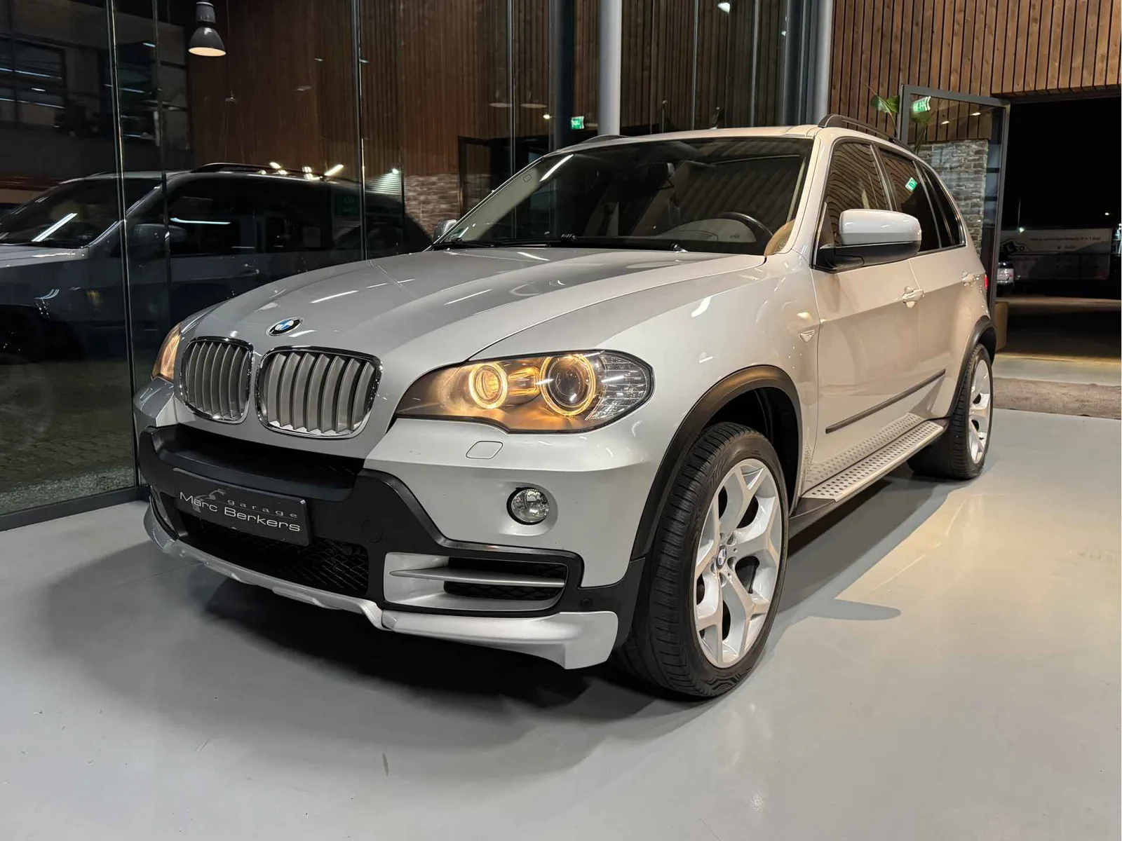 BMW X5 (2009) — foto 1