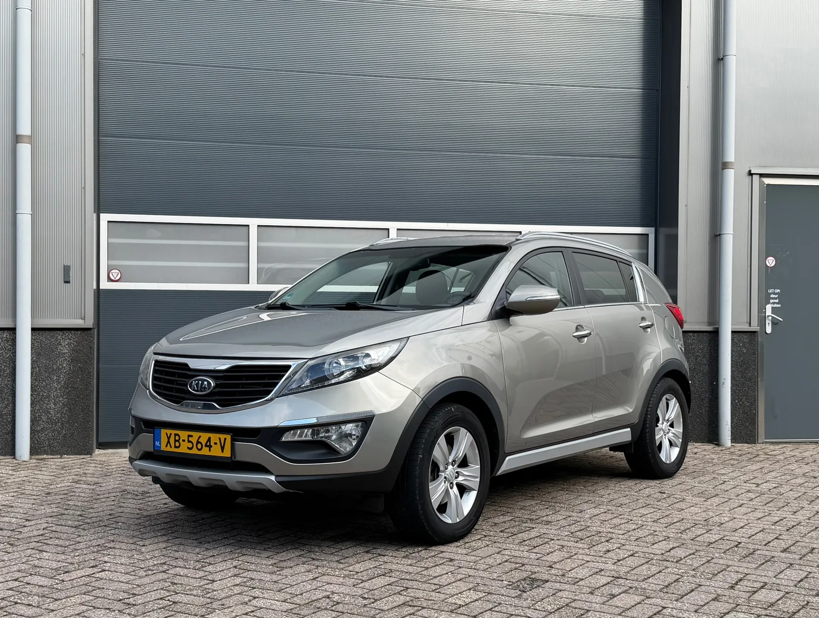 Kia Sportage (2012) — foto 1