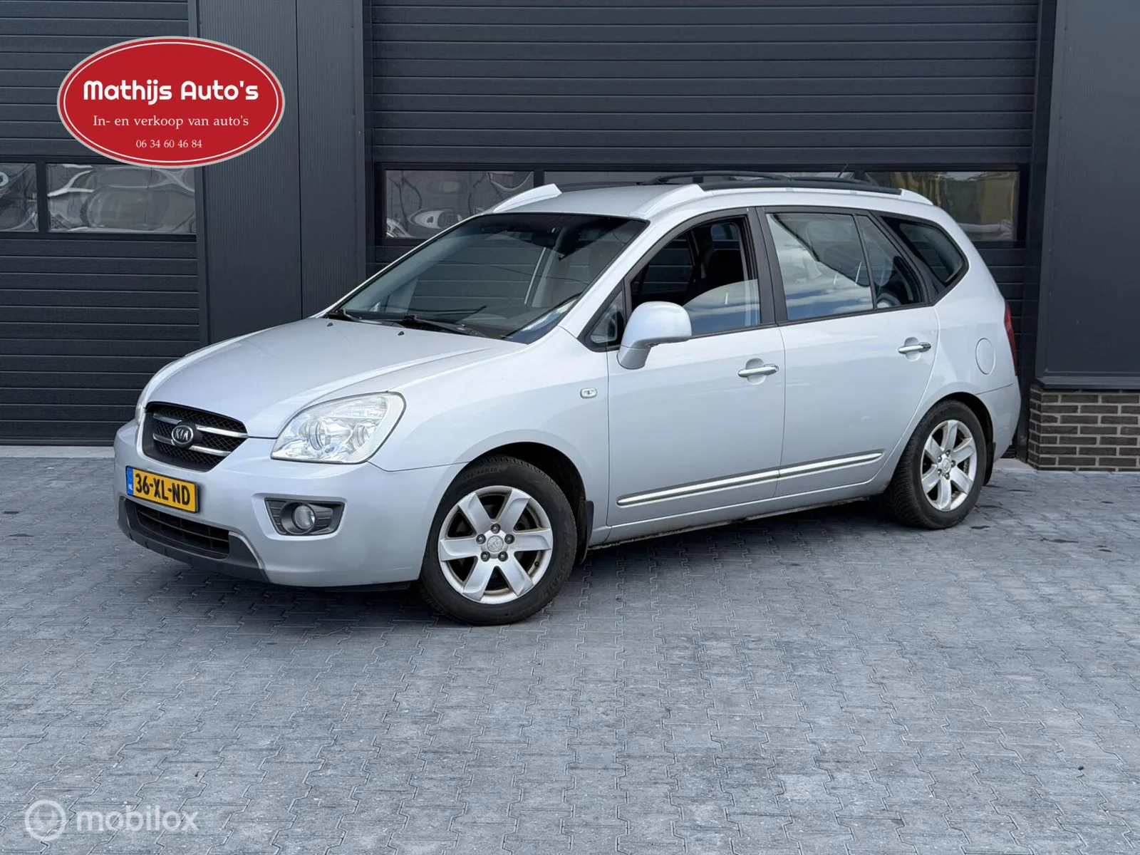 Kia Carens (2007) — foto 1