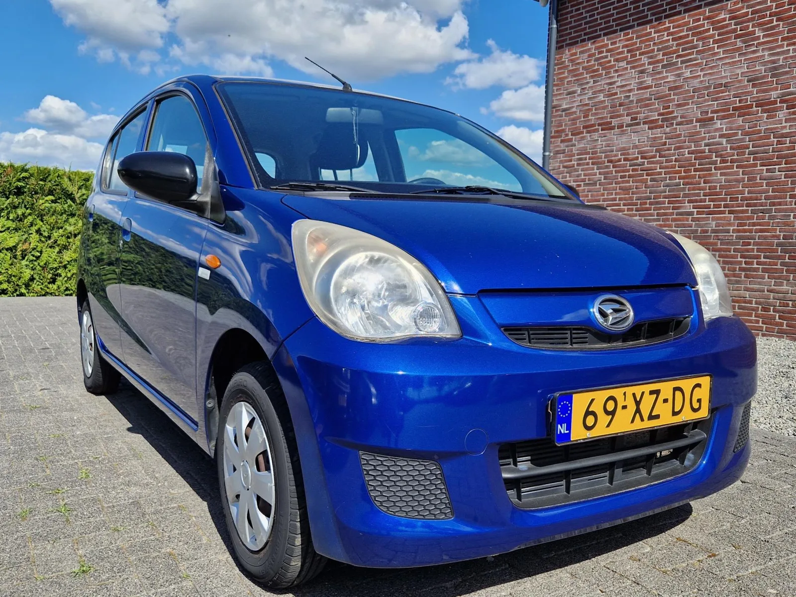 Daihatsu Cuore (2007) — foto 1