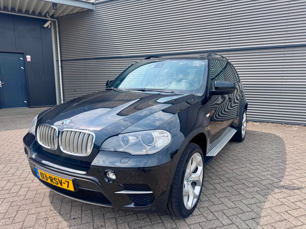 BMW X5 (2010) — foto 1
