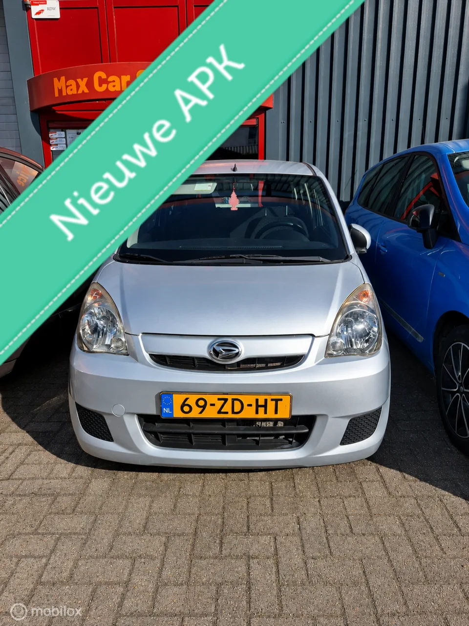 Daihatsu Cuore (2008) — foto 1