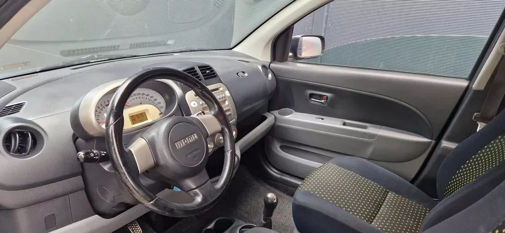 Daihatsu Sirion (2009) — foto 1