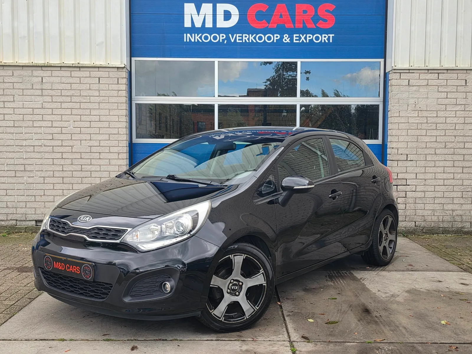 Kia Rio (2011) — foto 1