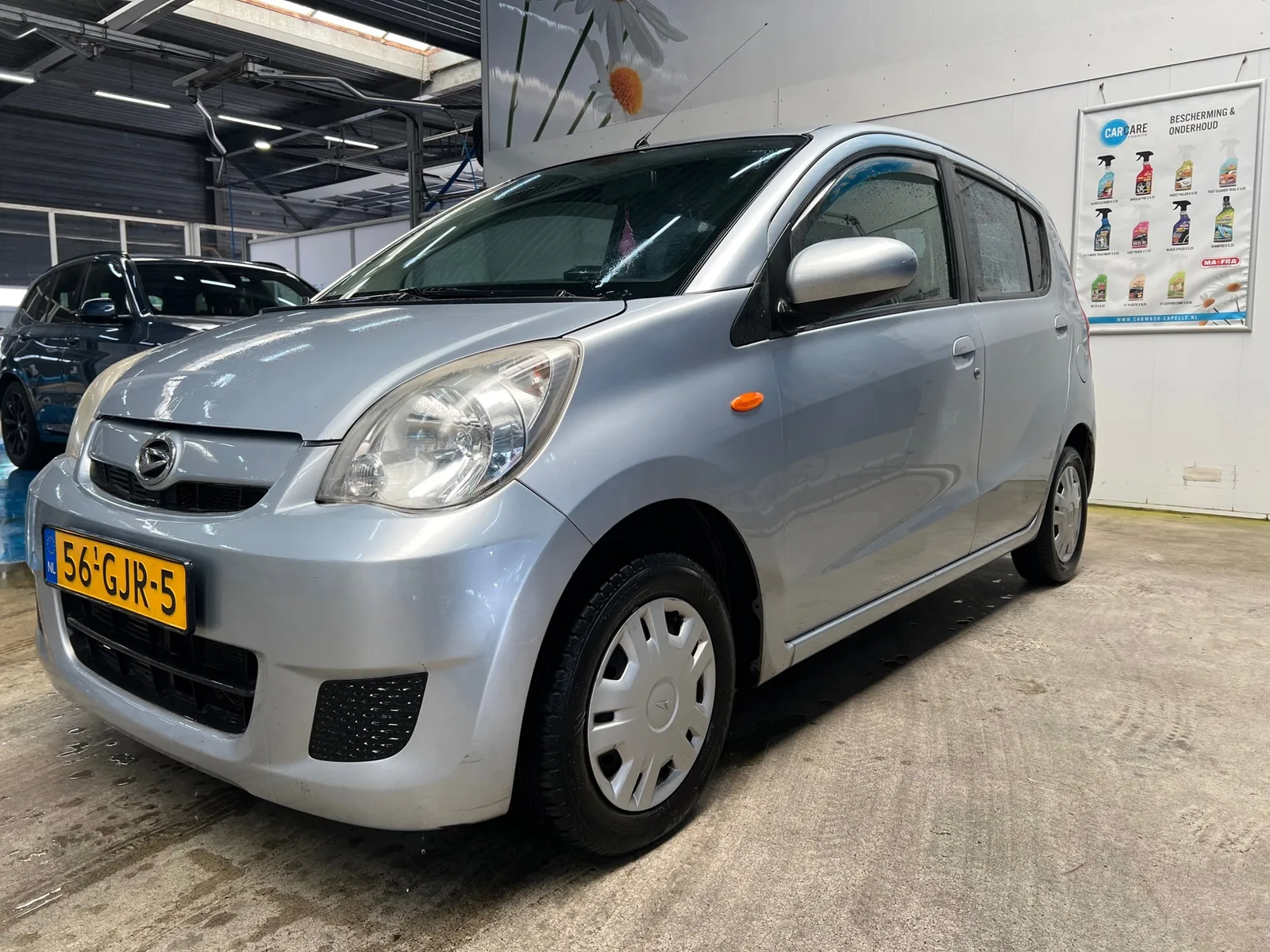 Daihatsu Cuore (2008) — foto 1