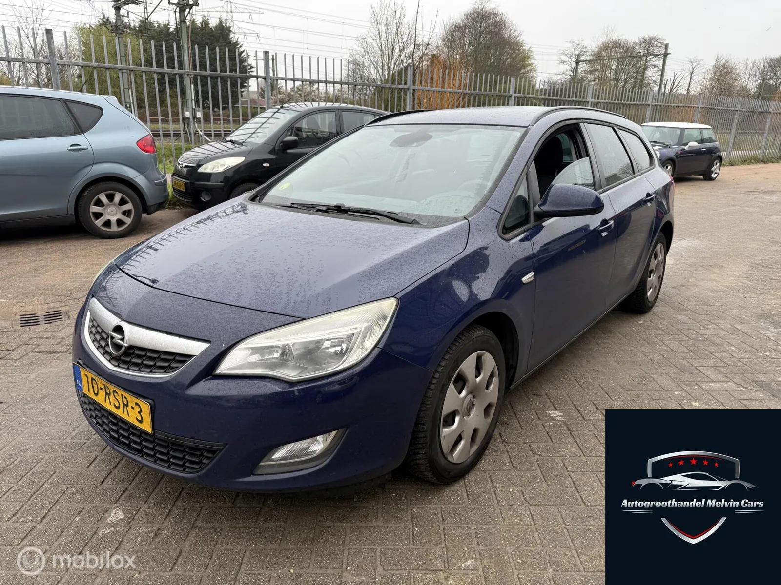 Opel Astra (2011) — foto 1