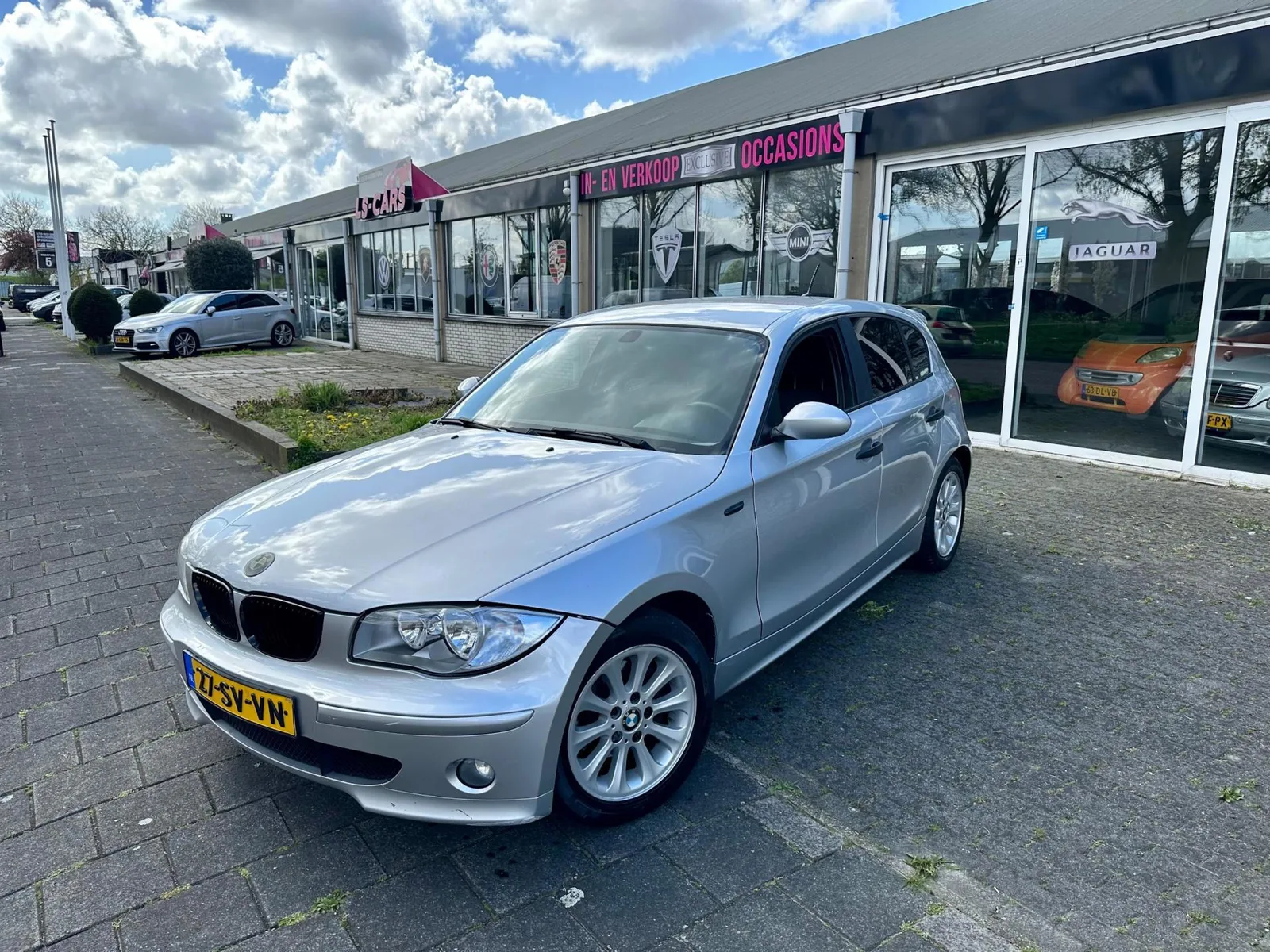BMW 1-Serie (2006) — foto 1