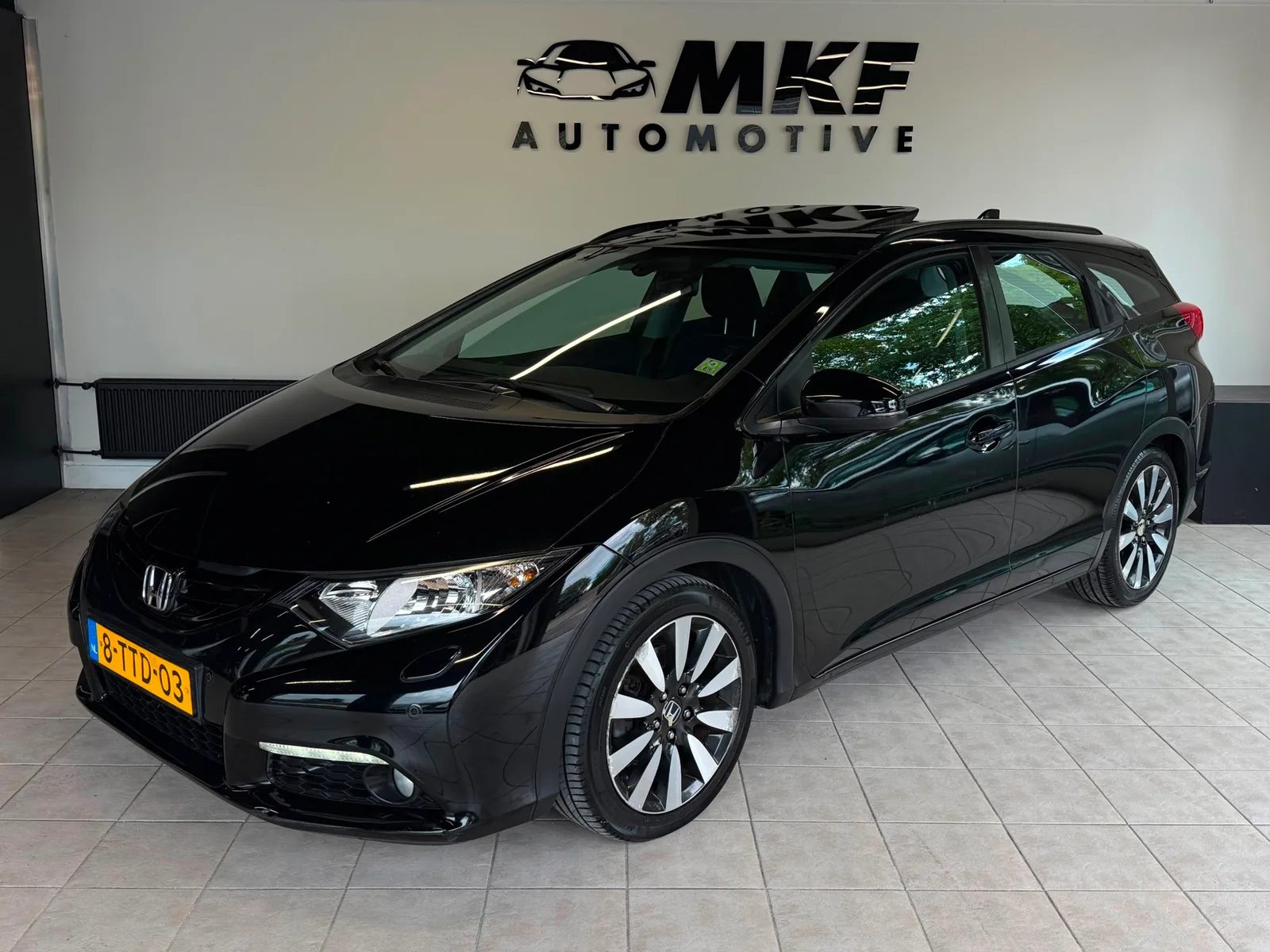 Honda Civic (2014) — foto 1