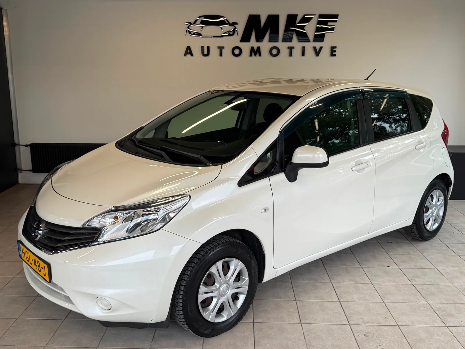 Nissan Note (2012) — foto 1