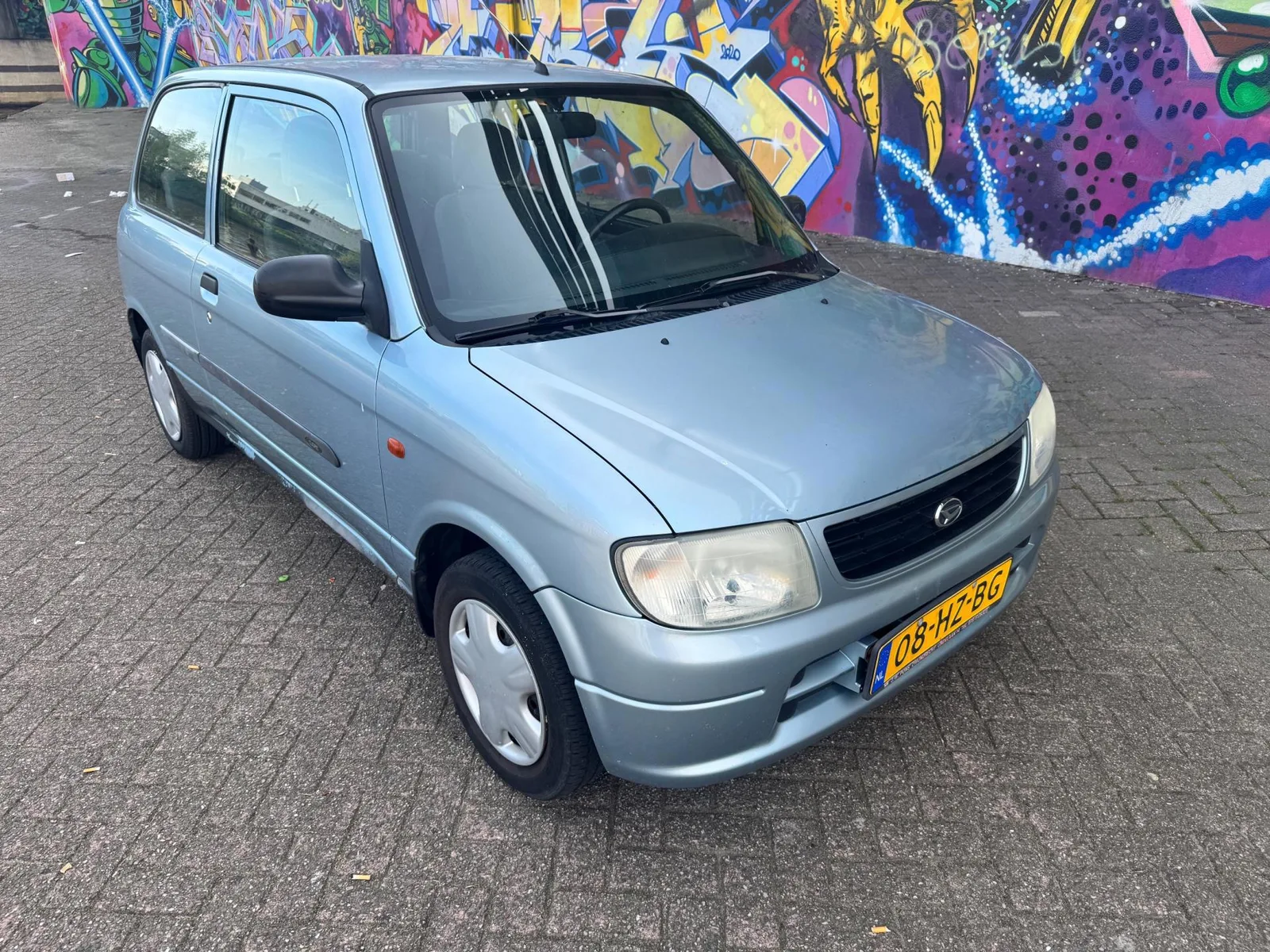 Daihatsu Cuore (2002) — foto 1
