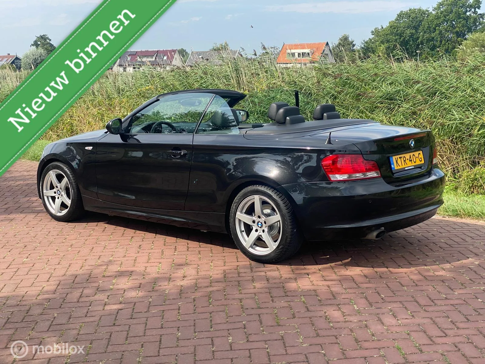 BMW 1-Serie (2010) — foto 1