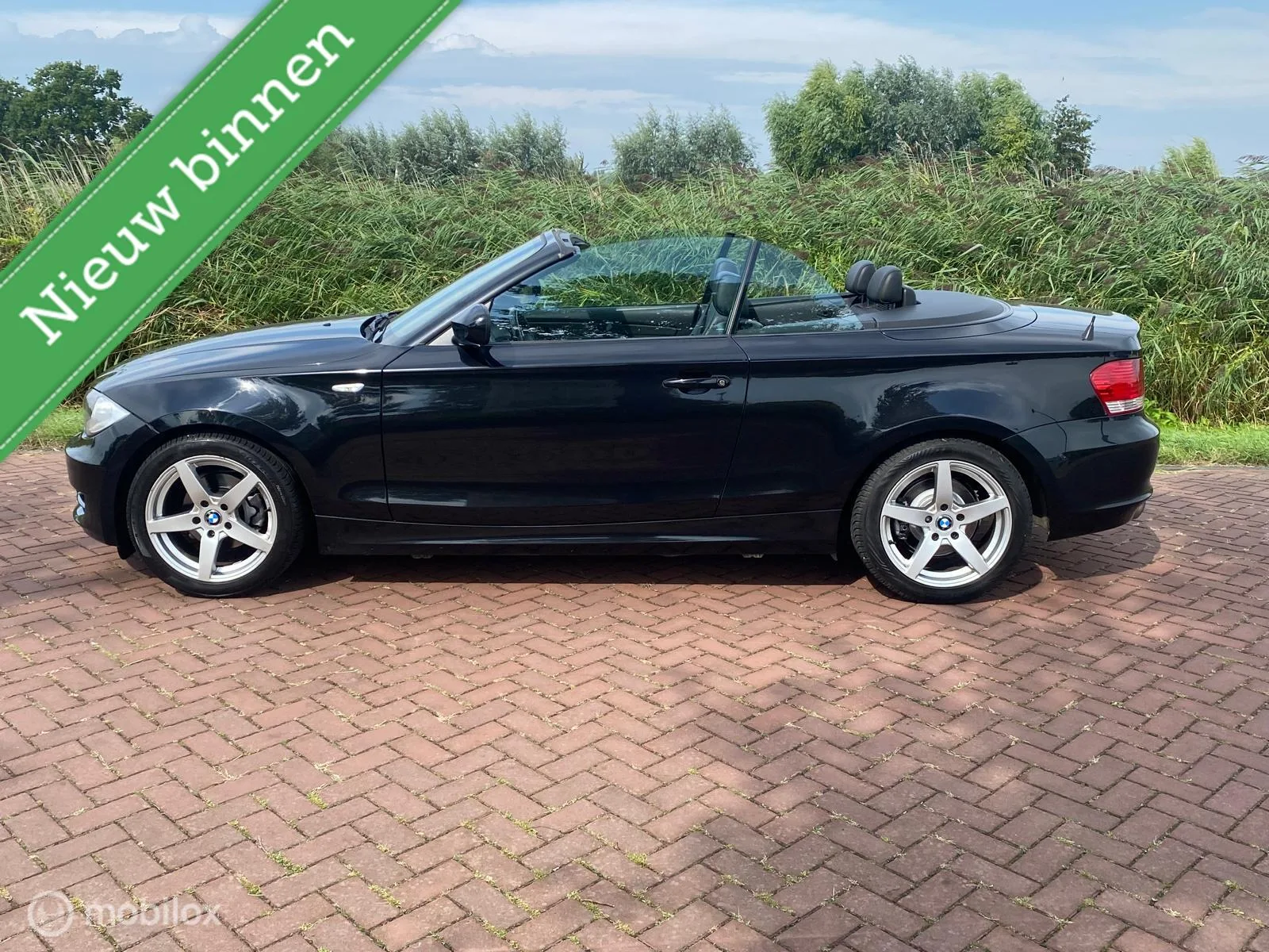 BMW 1-Serie (2010) — foto 1