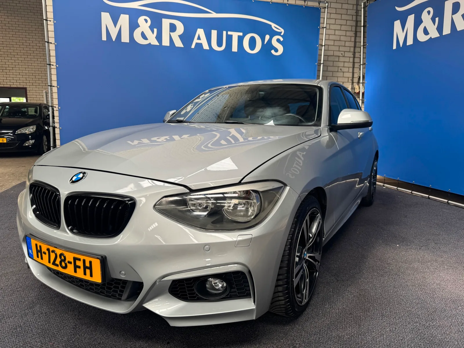 BMW 1-Serie (2011) — foto 1