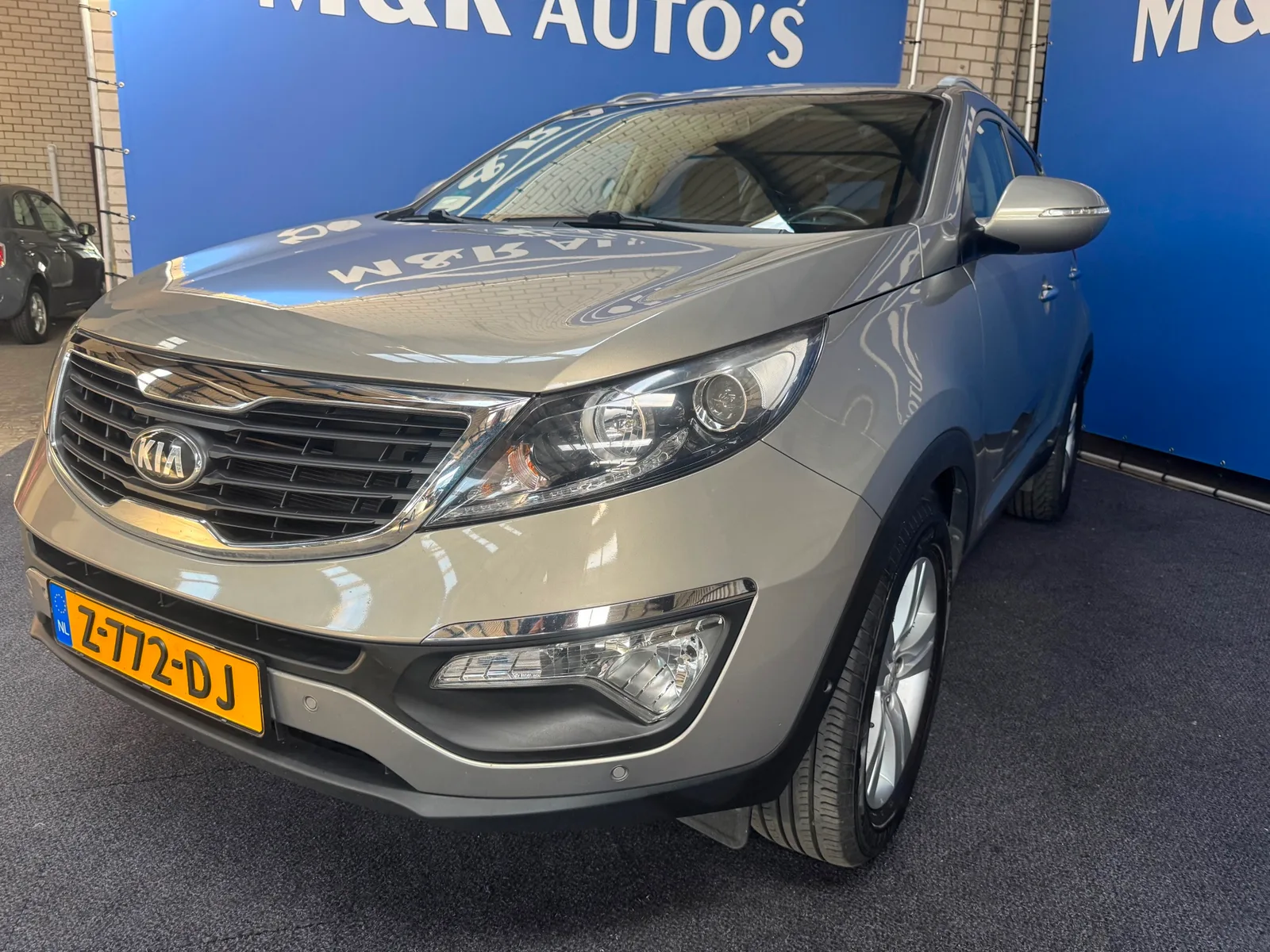 Kia Sportage (2012) — foto 1