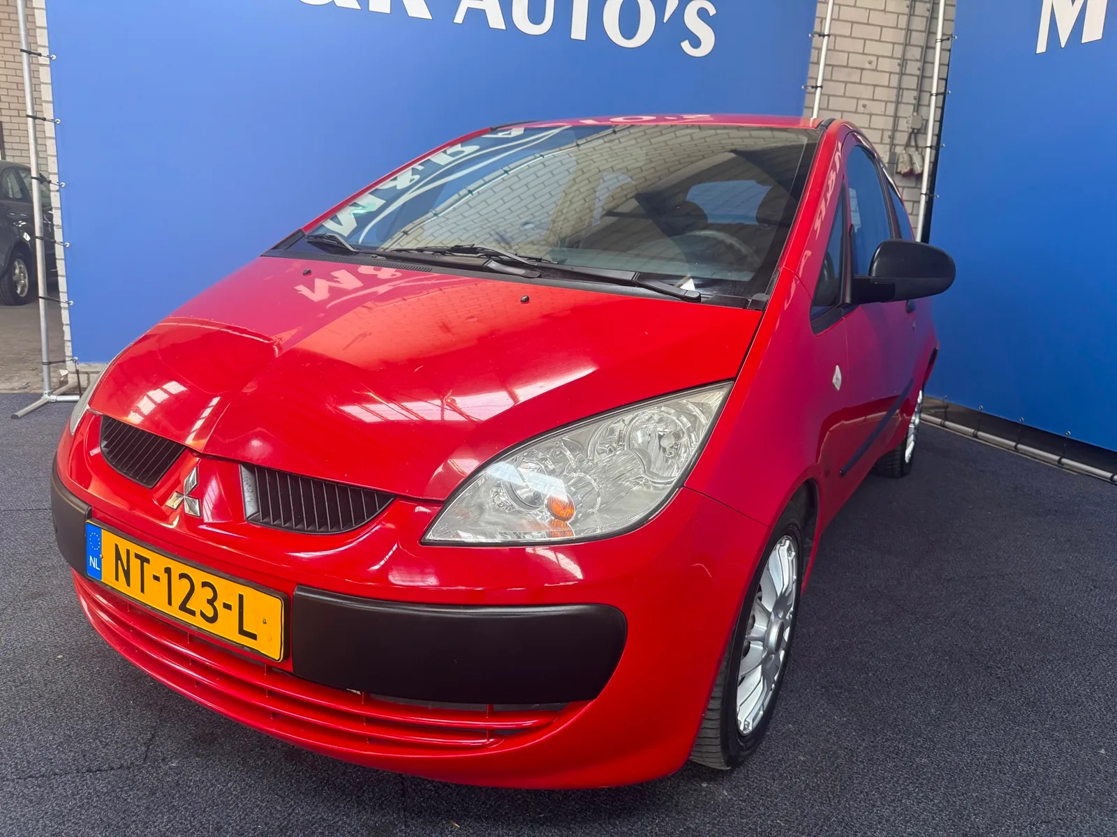 Mitsubishi Colt (2008) — foto 1