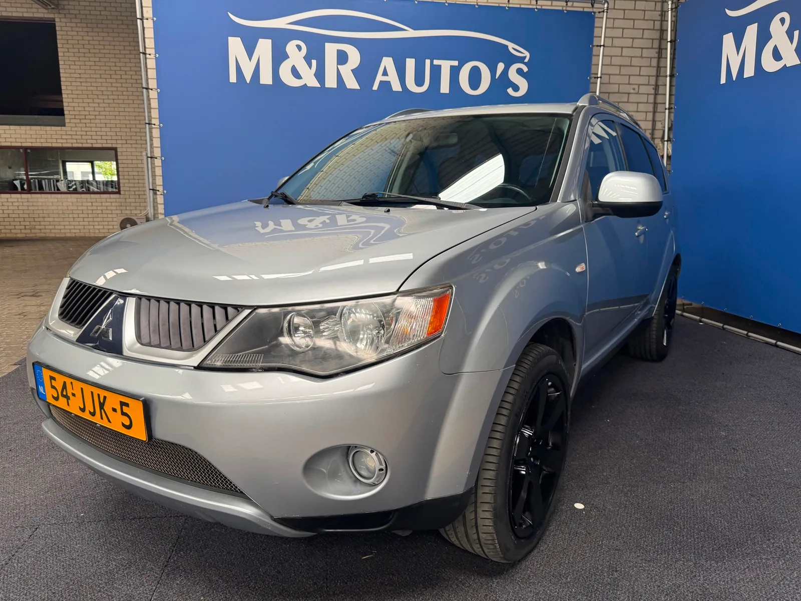 Mitsubishi Outlander (2009) — foto 1