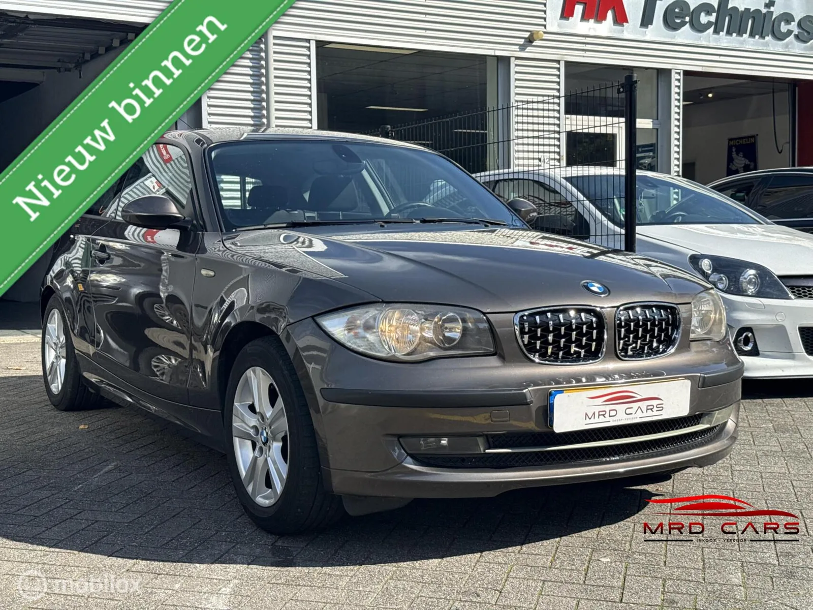 BMW 1-Serie (2009) — foto 1
