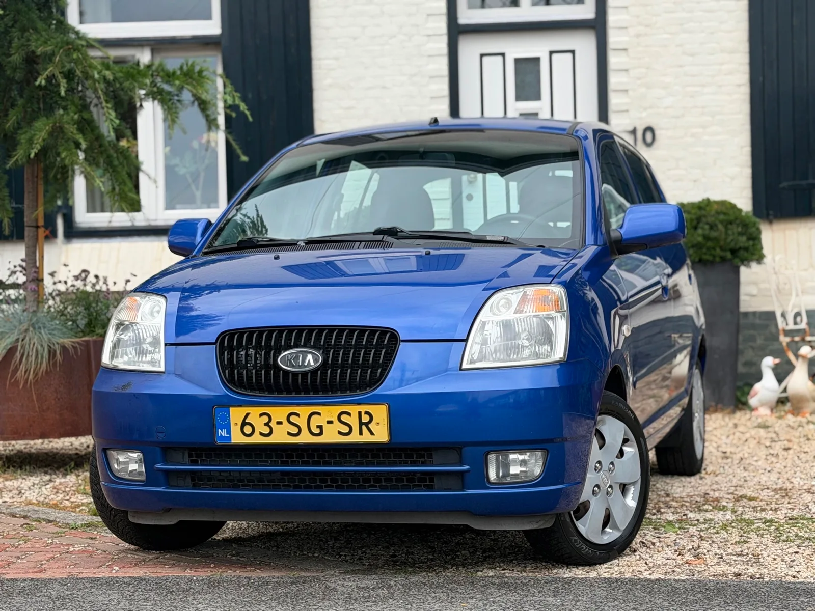 Kia Picanto (2006) — foto 1