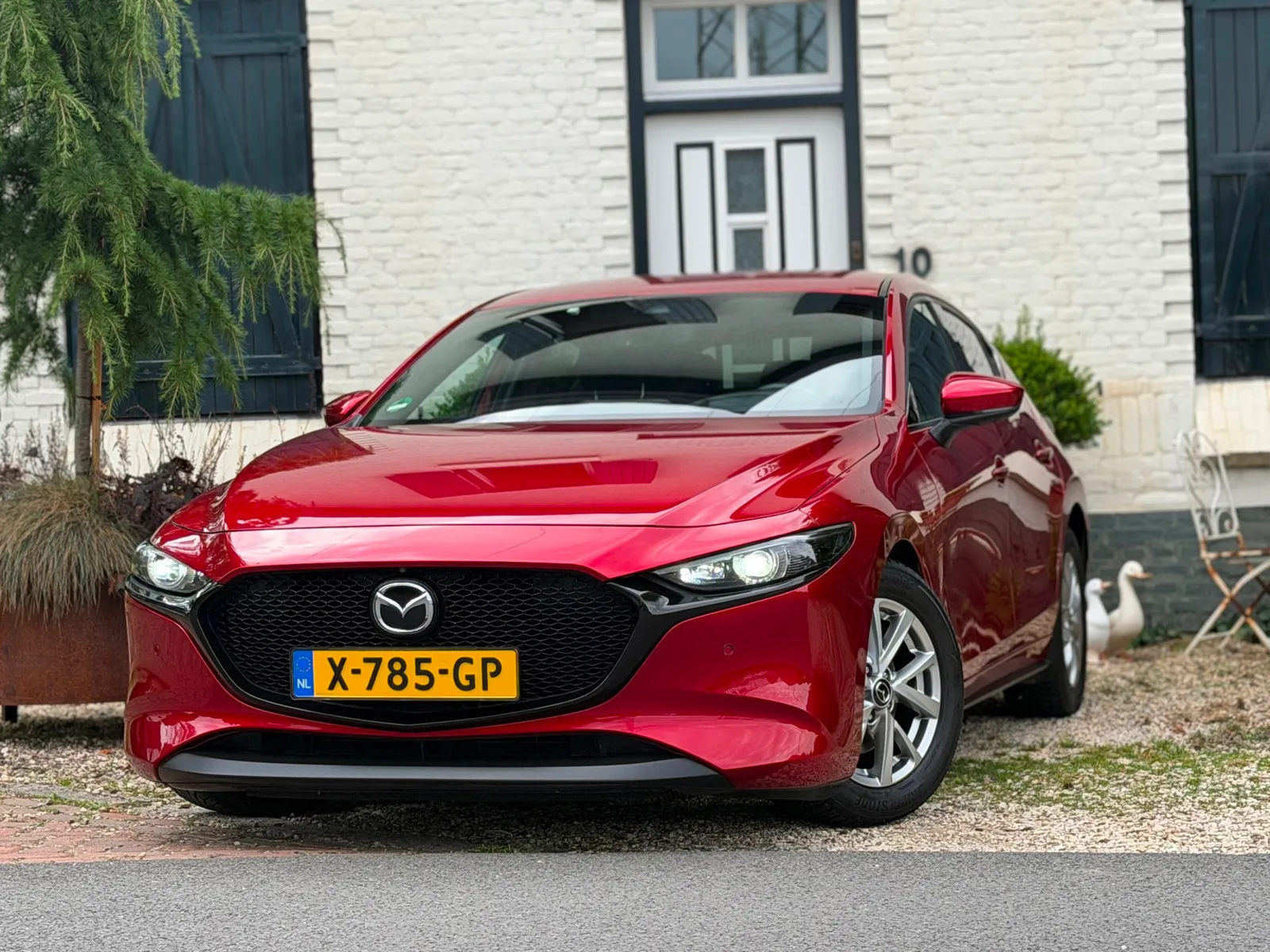 Mazda 3 (2019) — foto 1
