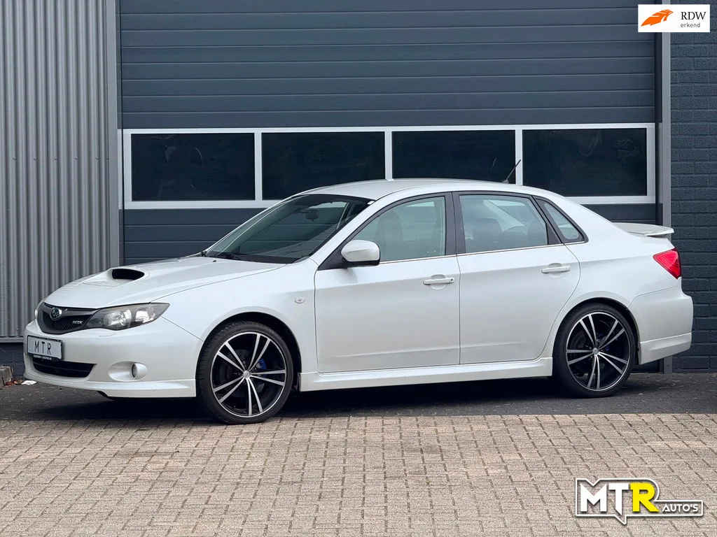 Subaru Impreza (2009) — foto 1
