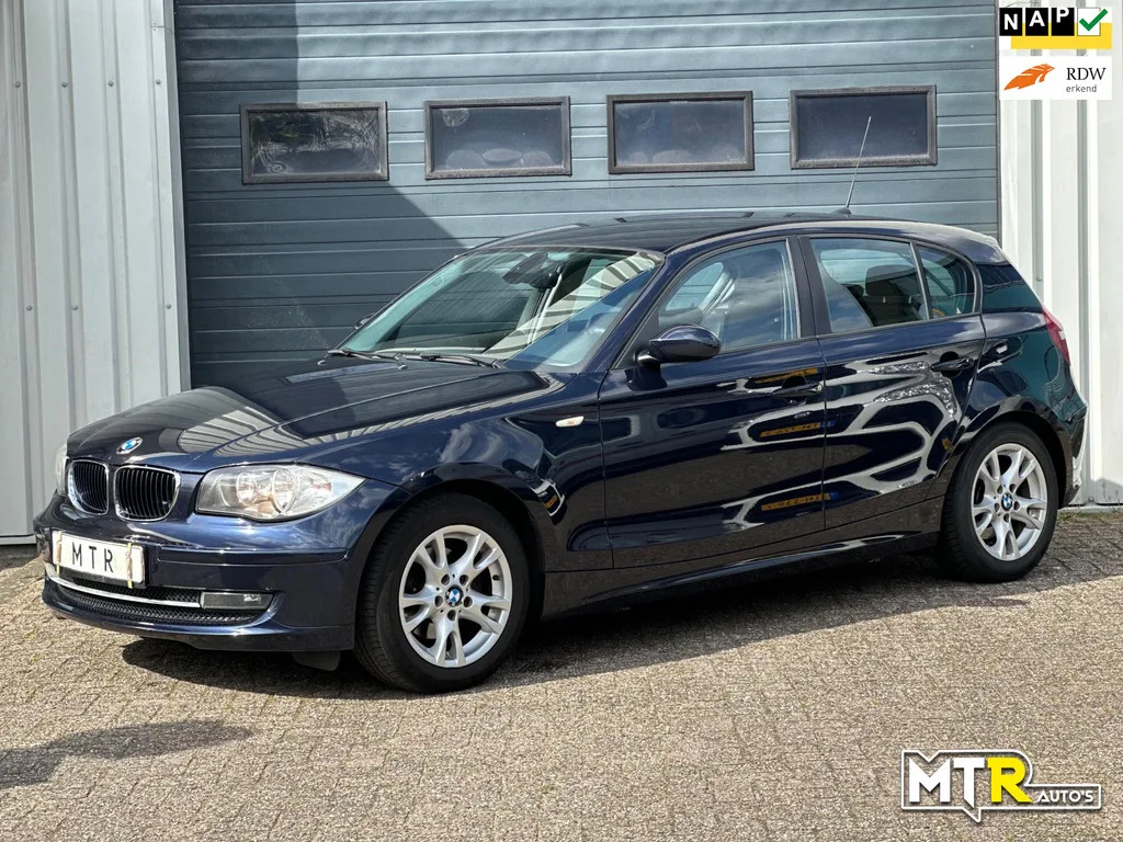 BMW 1-Serie (2009) — foto 1