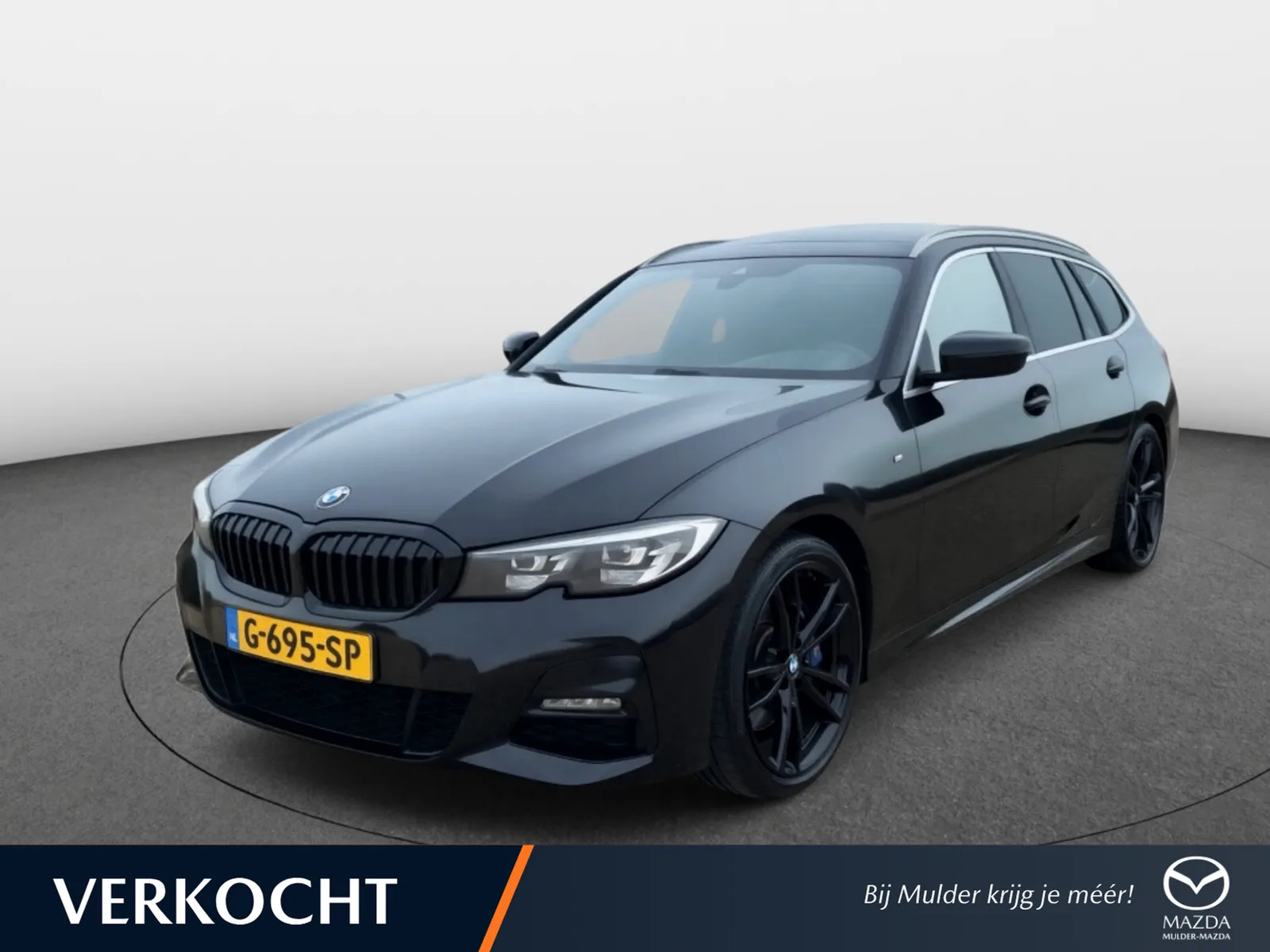 Mazda Touring (2019) — foto 1