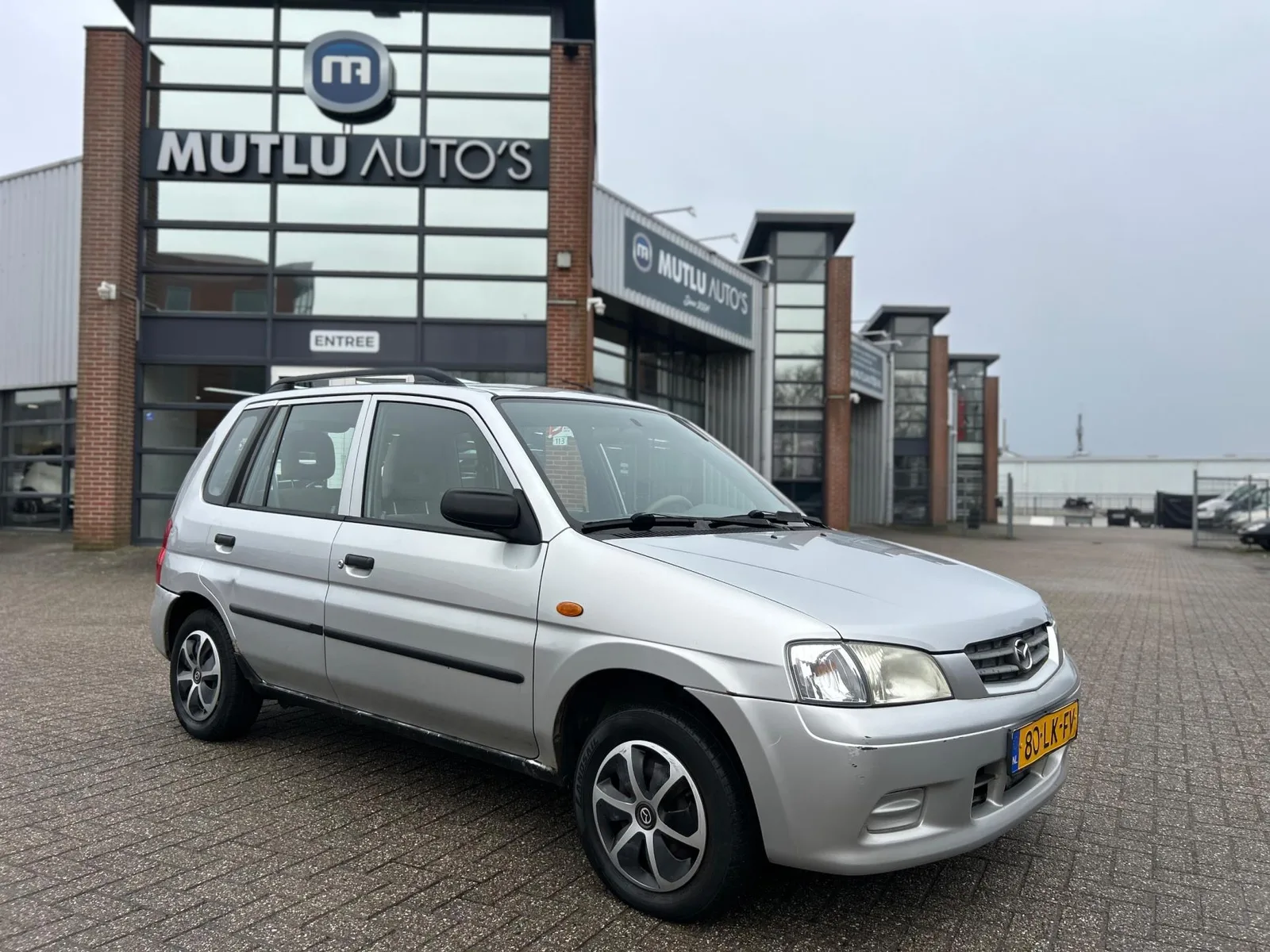 Mazda Demio (2003) — foto 1