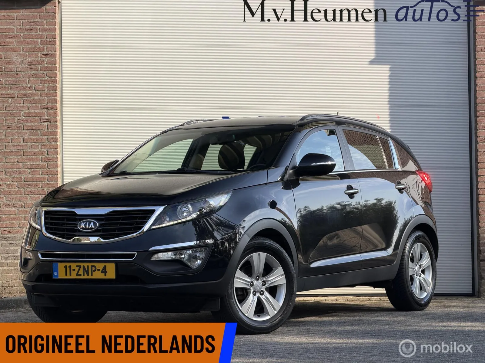 Kia Sportage (2013) — foto 1