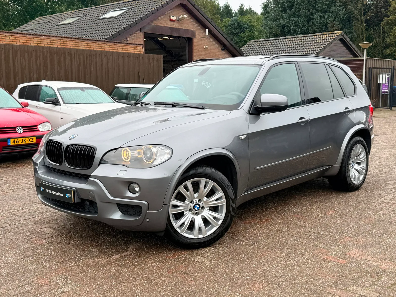 BMW X5 (2010) — foto 1