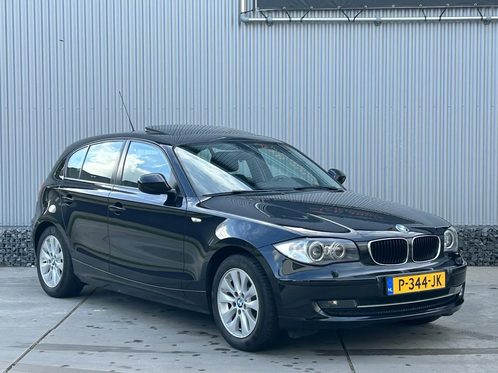 BMW 1-Serie (2009) — foto 1