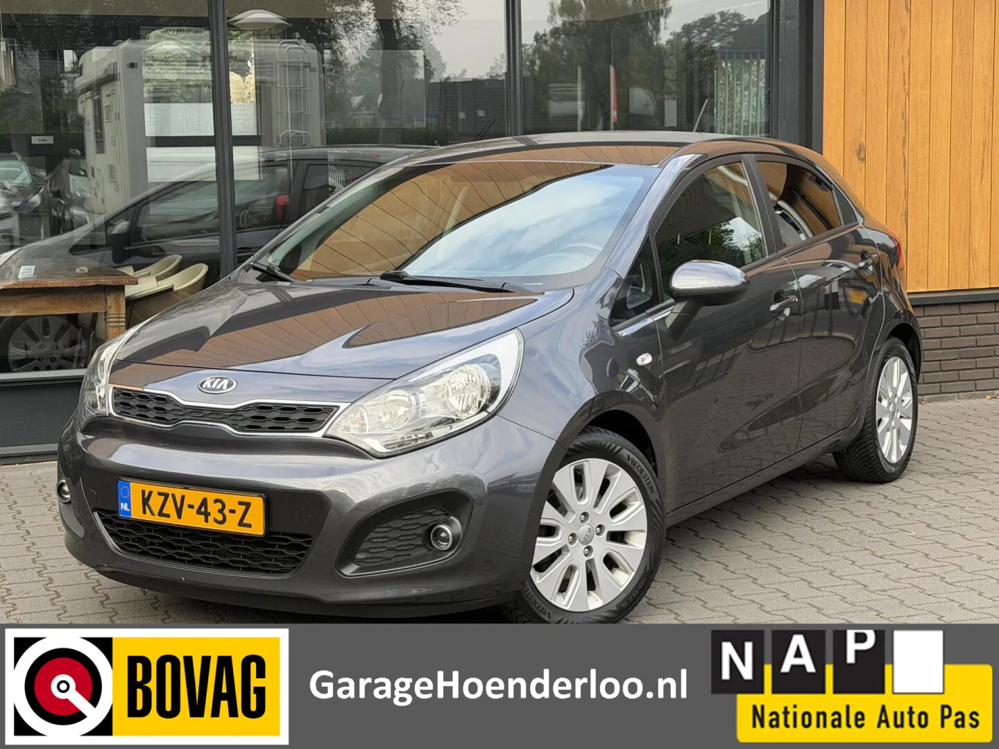 Kia Rio (2014) — foto 1