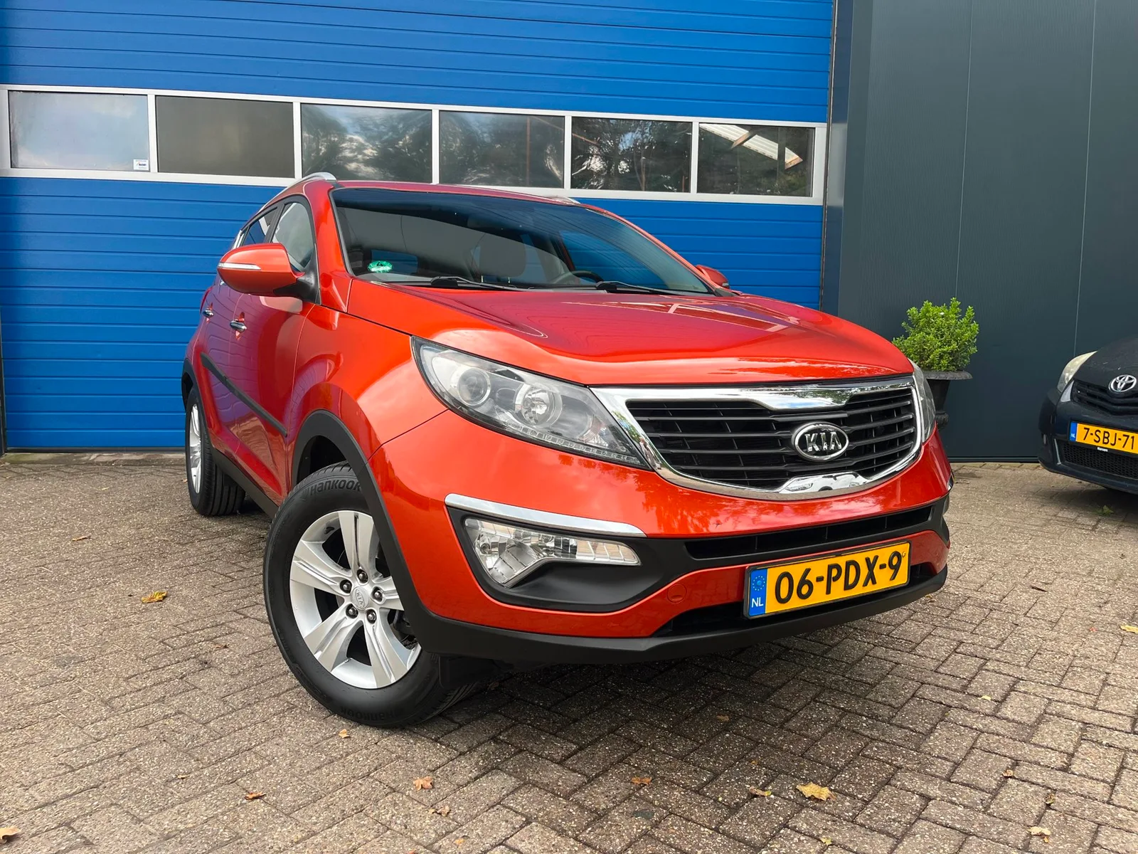 Kia Sportage (2011) — foto 1