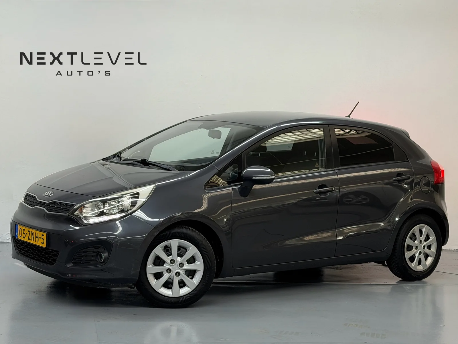 Kia Rio (2013) — foto 1
