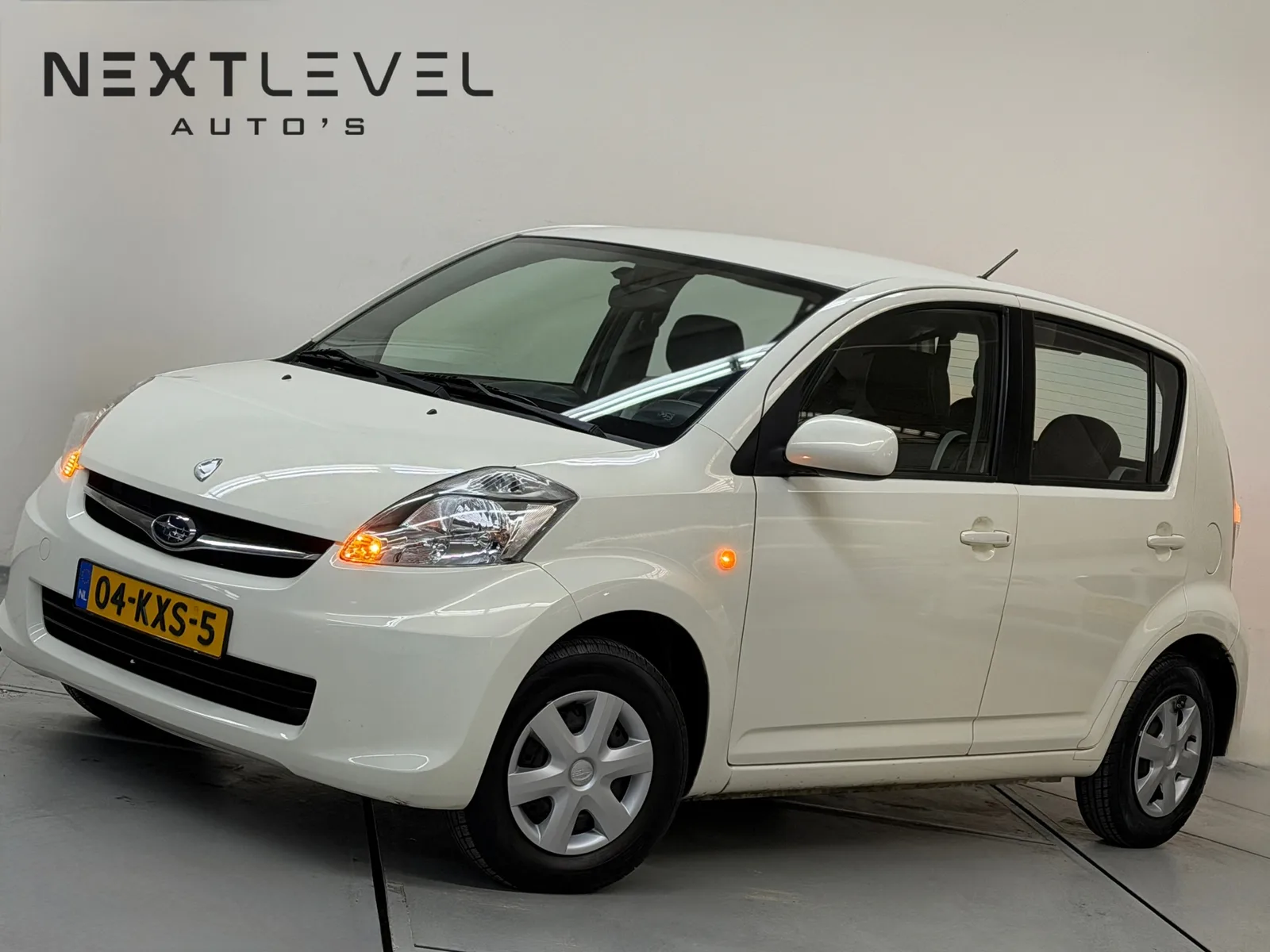 Subaru Justy (2010) — foto 1