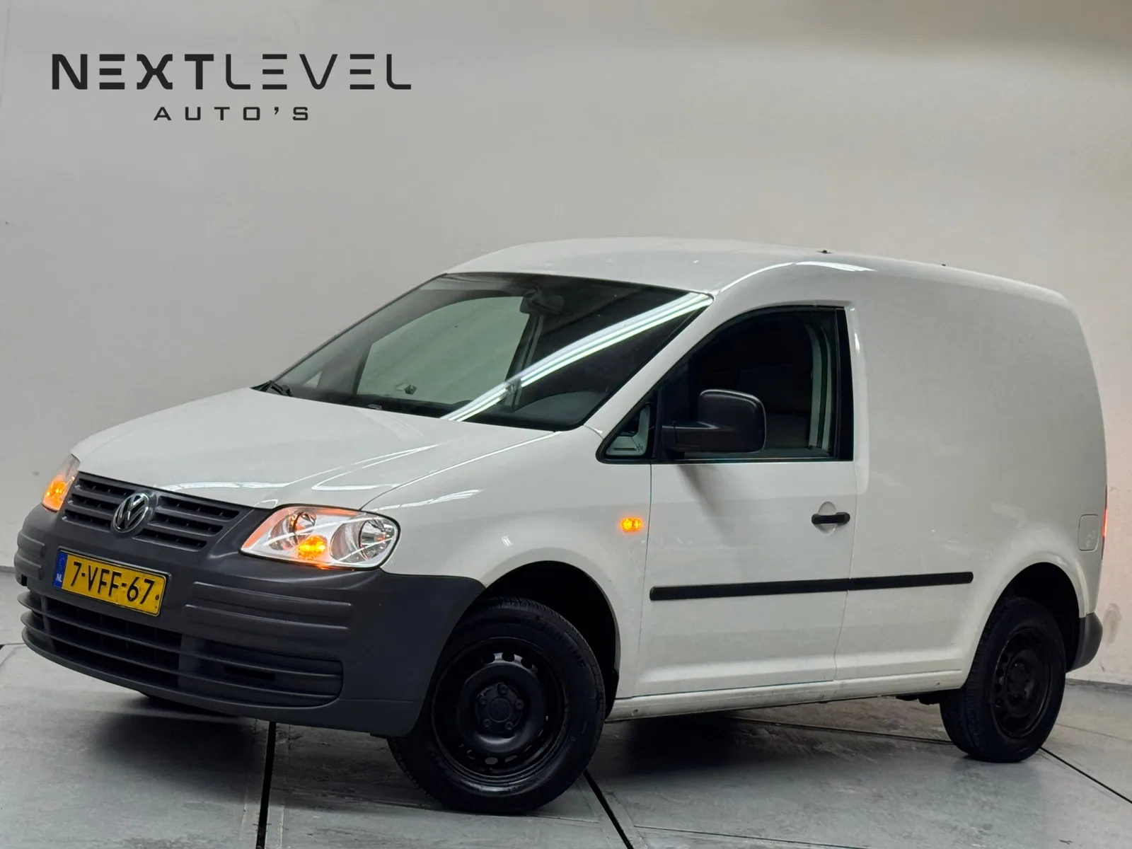 Volkswagen Caddy (2009) — foto 1