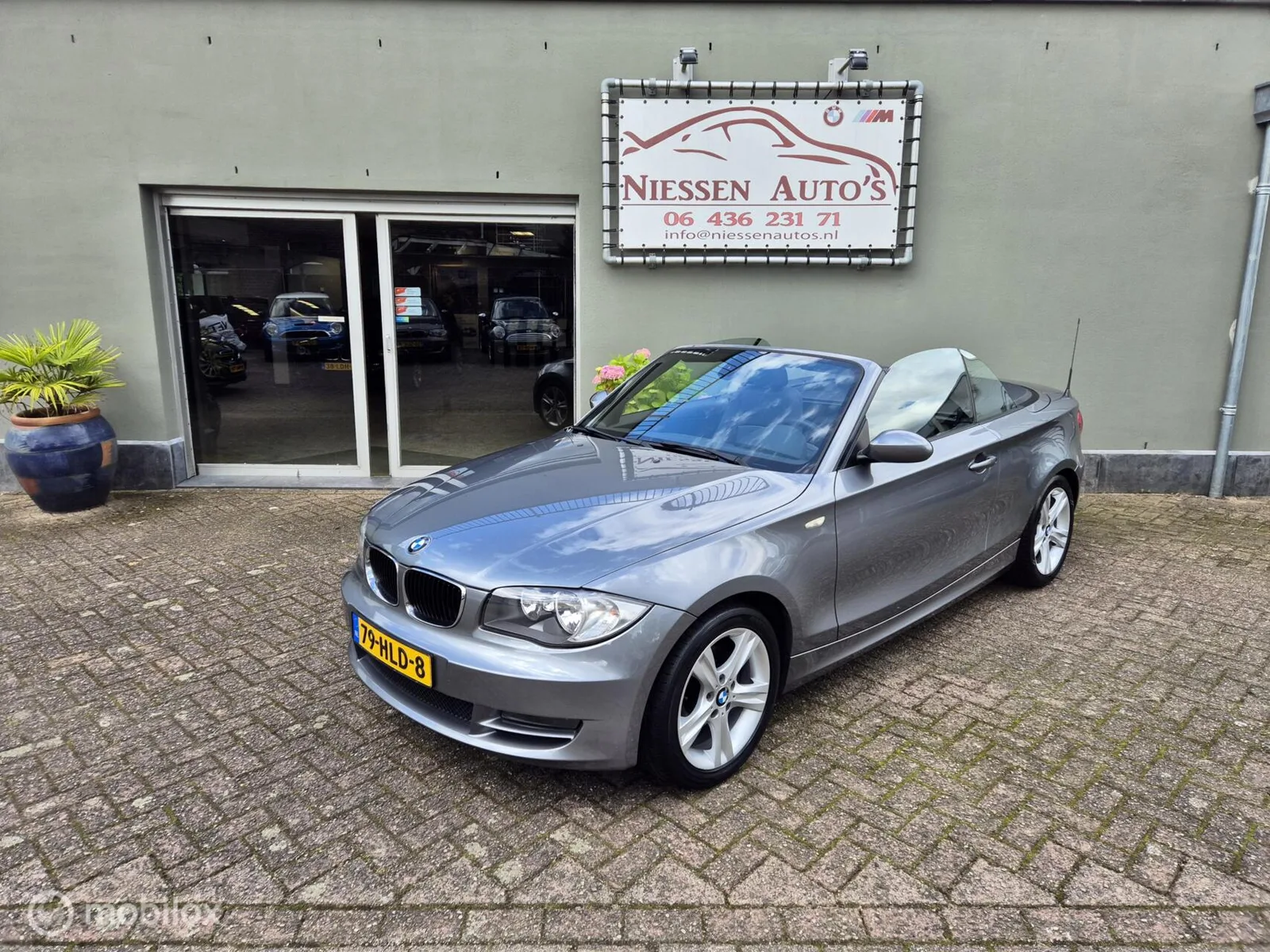 BMW 1-Serie (2009) — foto 1