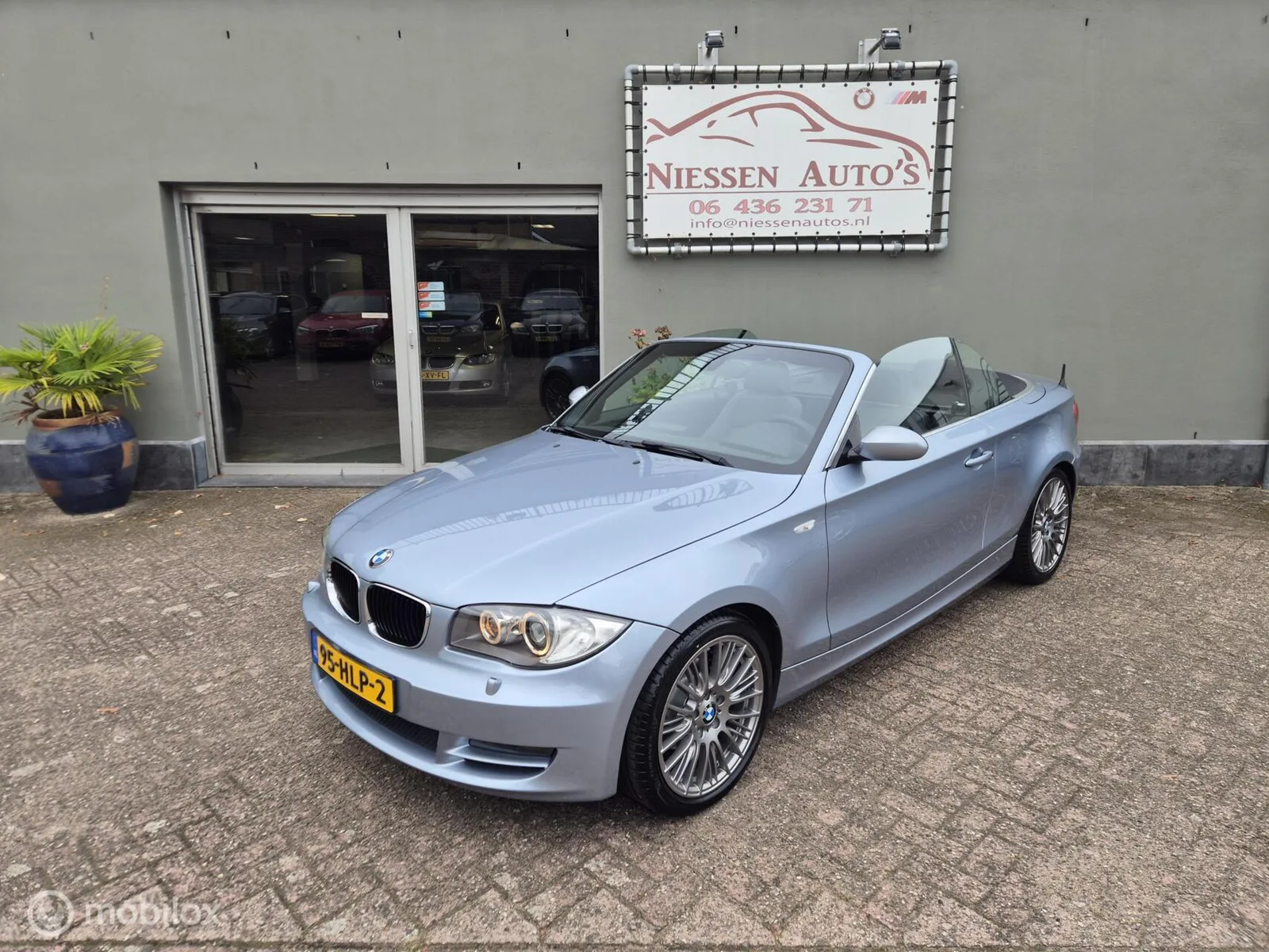 BMW 1-Serie (2009) — foto 1