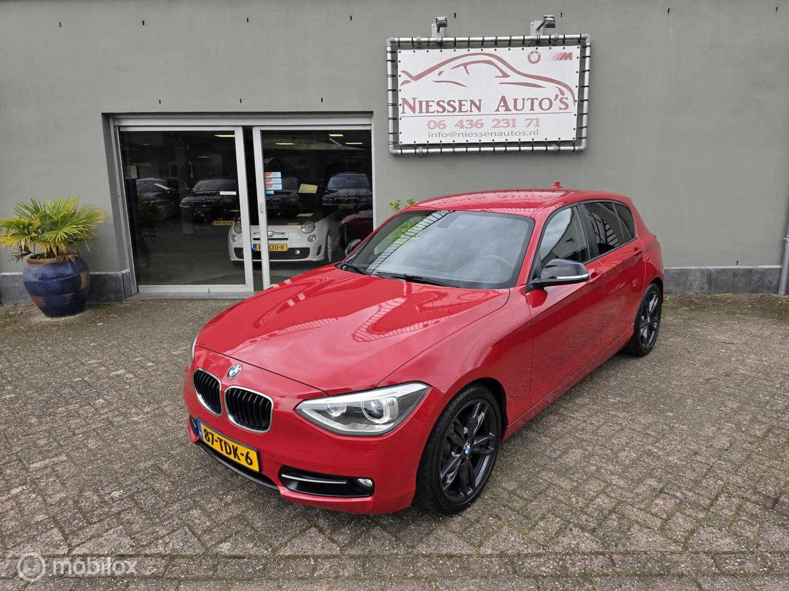 BMW 1-Serie (2012) — foto 1