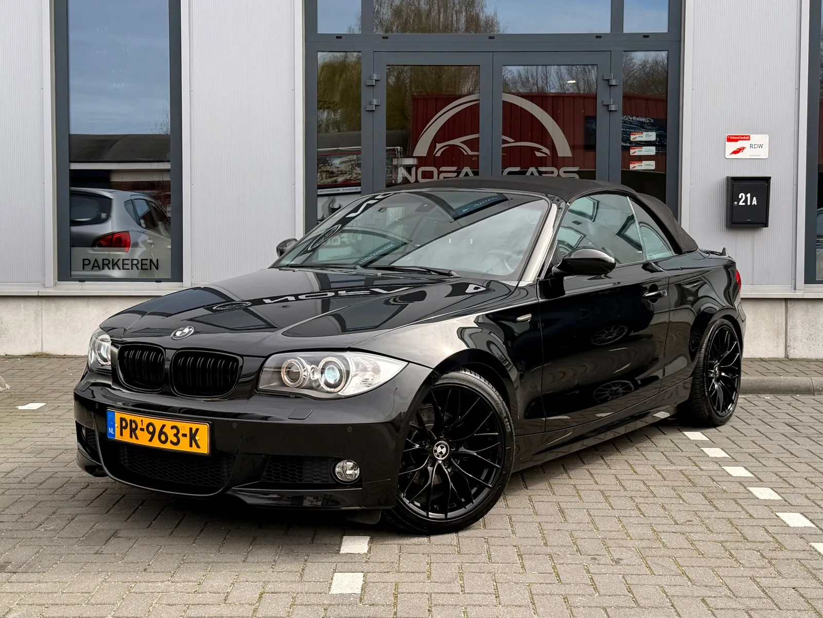 BMW 1-Serie (2009) — foto 1
