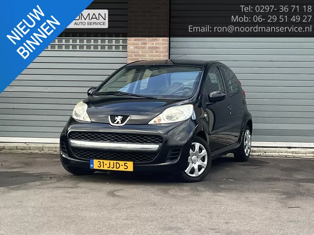Peugeot 107 (2009) — foto 1
