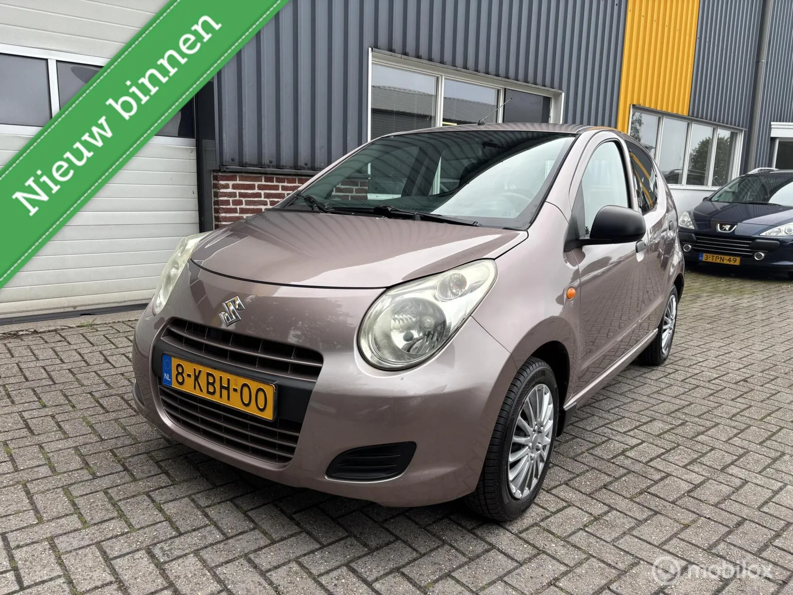 Suzuki Alto (2011) — foto 1
